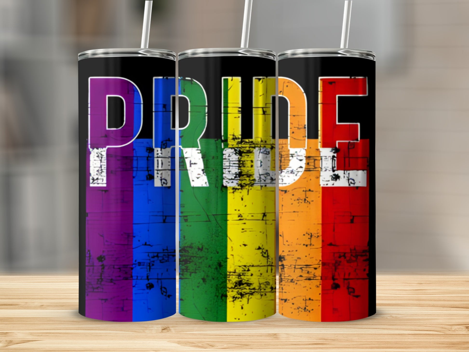 Rainbow pride flag tumbler with "PRIDE" text.