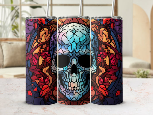 Three tumblers with a stained-glass skull design and floral accents.