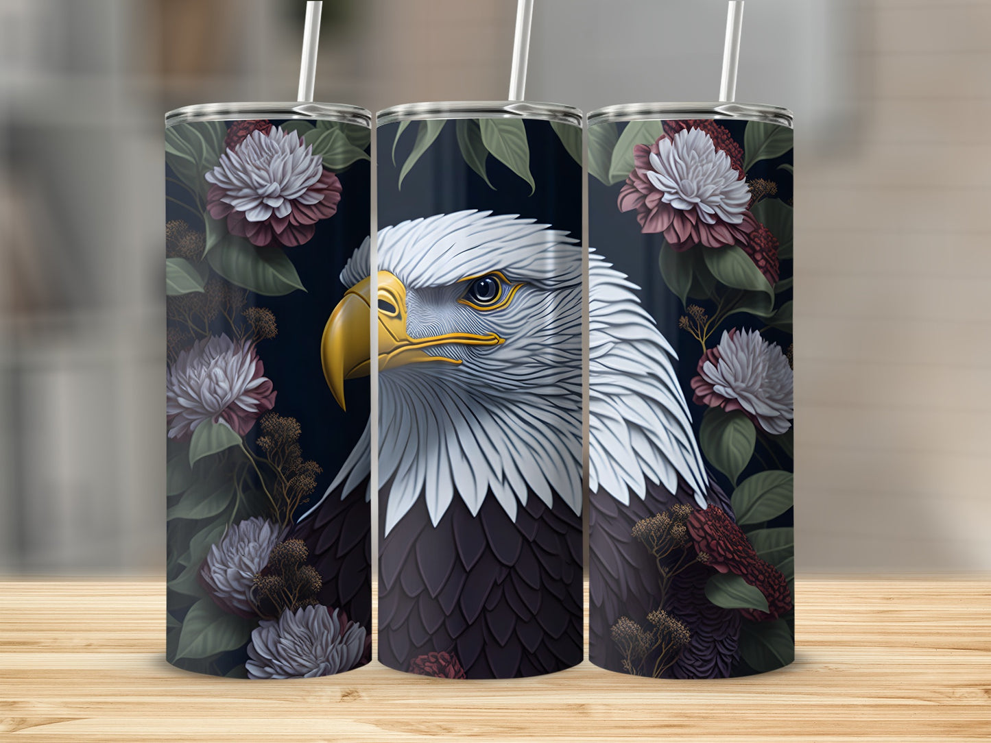 Three tumblers with an eagle and floral design.