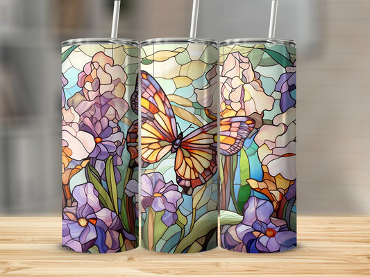Three tumblers with stained glass butterfly and floral designs.