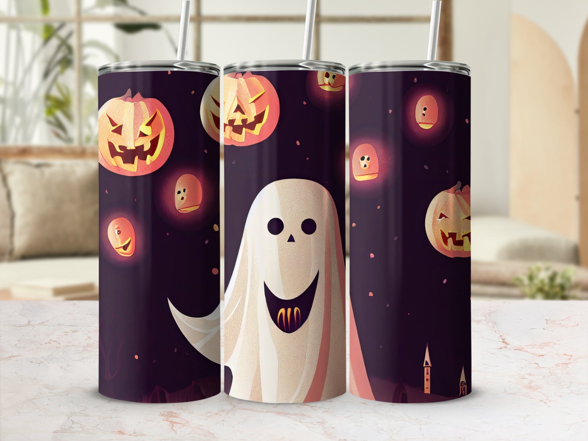Three tumblers with a Halloween theme, featuring jack-o'-lanterns and ghosts.
