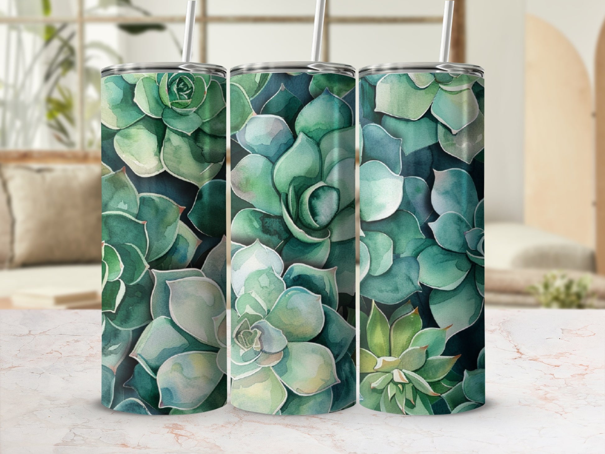 Three tumblers with a watercolor succulent design.