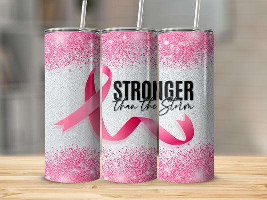 Pink ribbon tumbler with "Stronger Than The Storm" text.