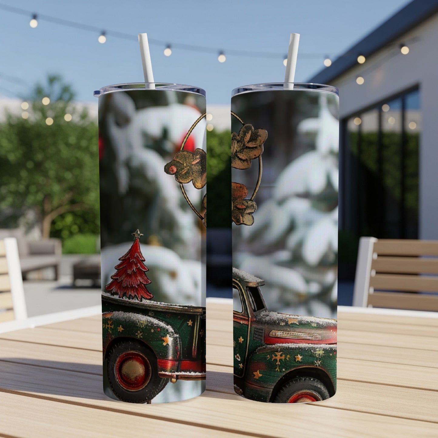 Christmas truck with tree and wreath tumbler on outdoor table.