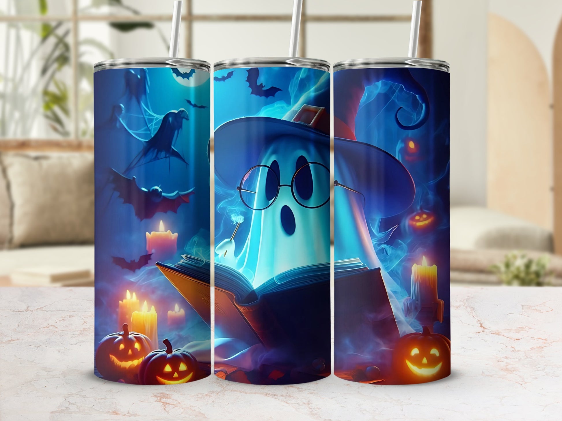 Halloween tumbler featuring a ghost reading a book with pumpkins and bats.