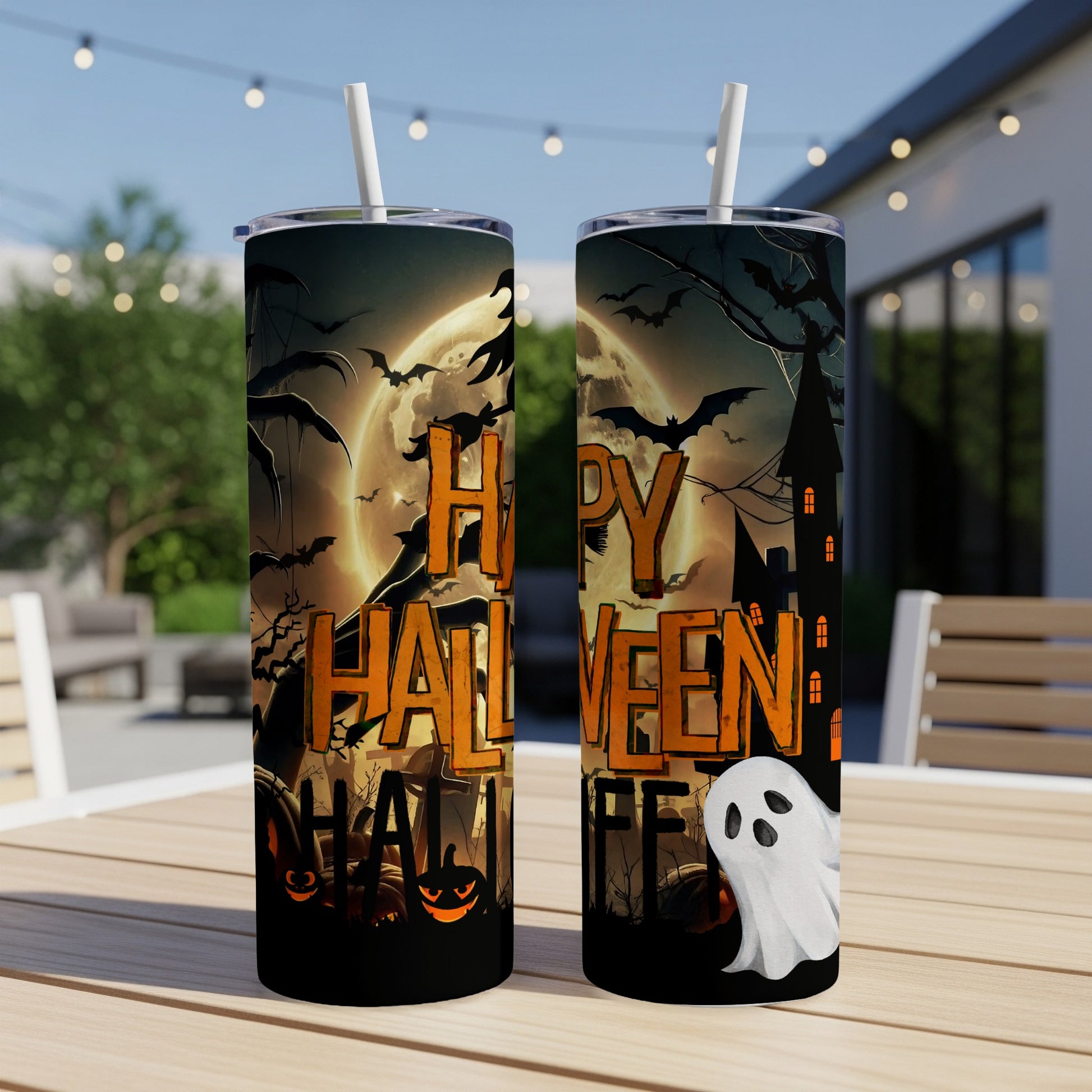 Two tumblers with a Halloween scene: full moon, bats, haunted house, pumpkins, and ghost.