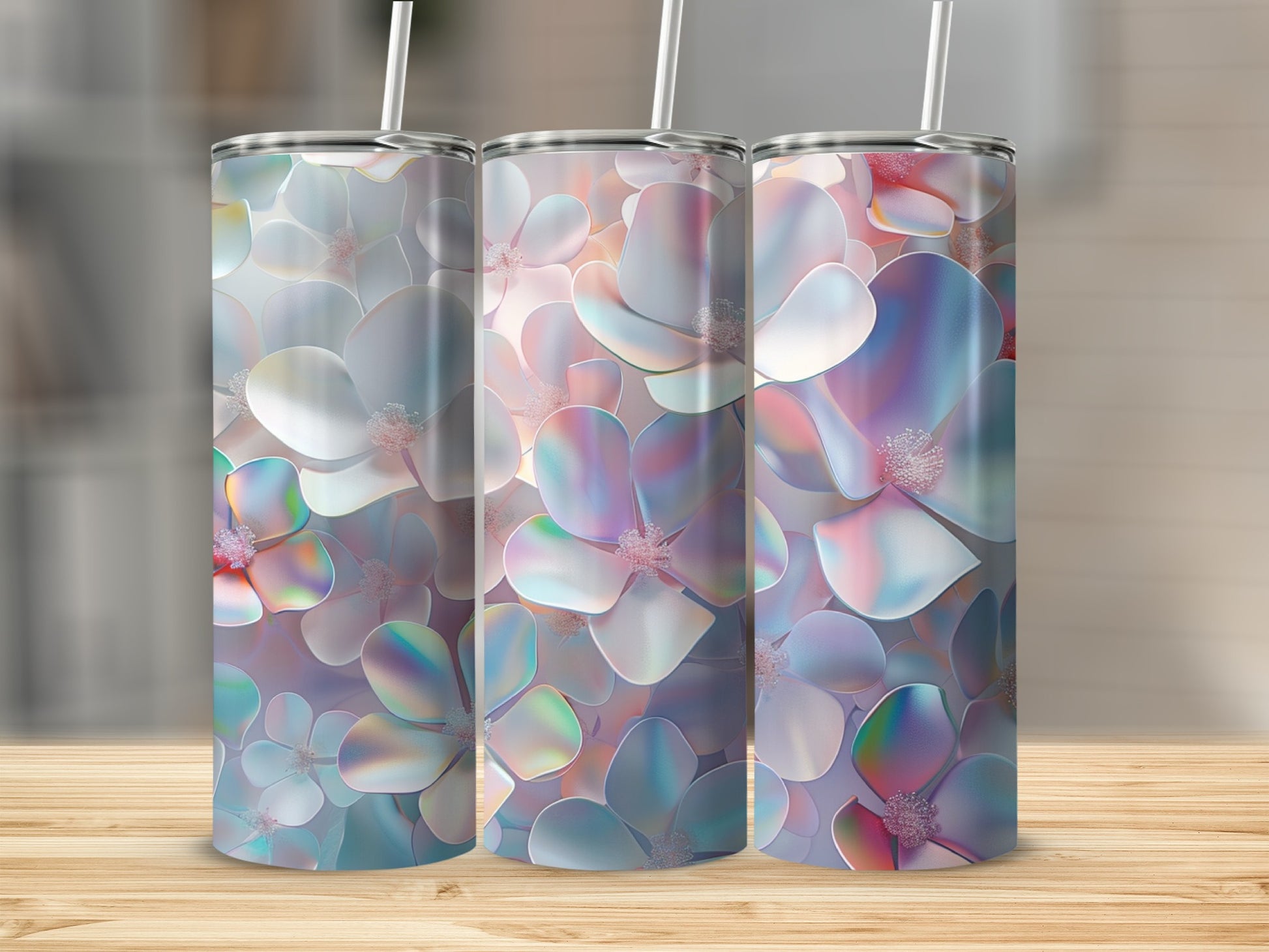 Three floral tumblers with iridescent petals on a wooden surface.