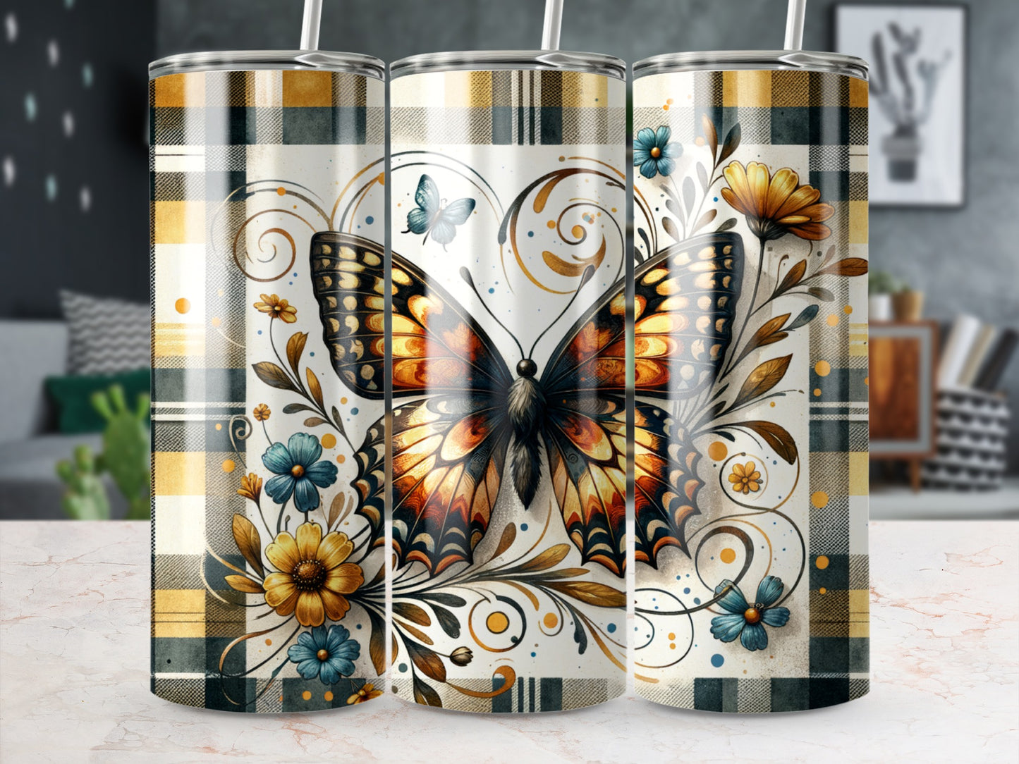 Butterfly and floral design on a plaid tumbler with a straw.