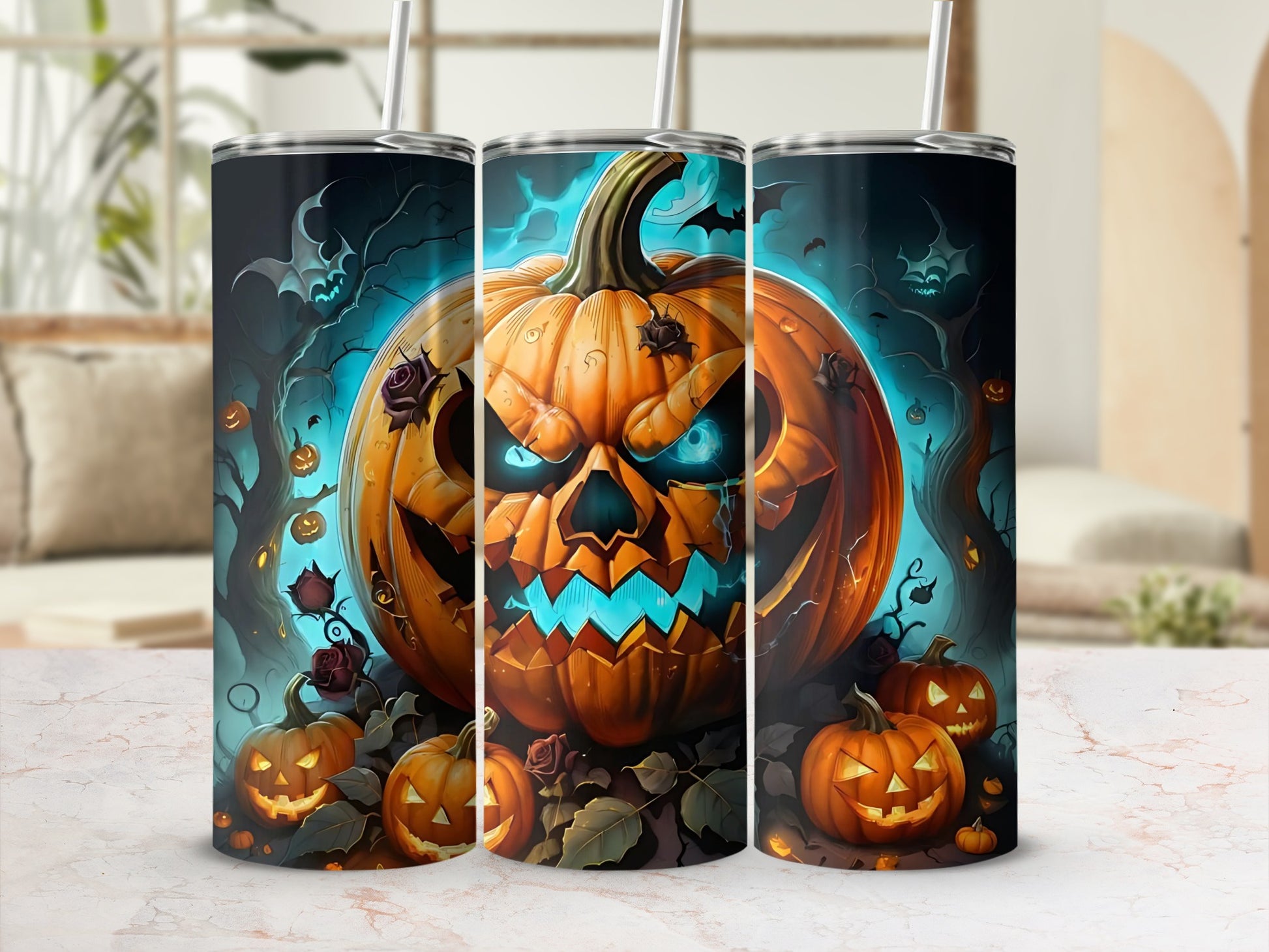 Three tumblers with a spooky Halloween pumpkin and bat design.