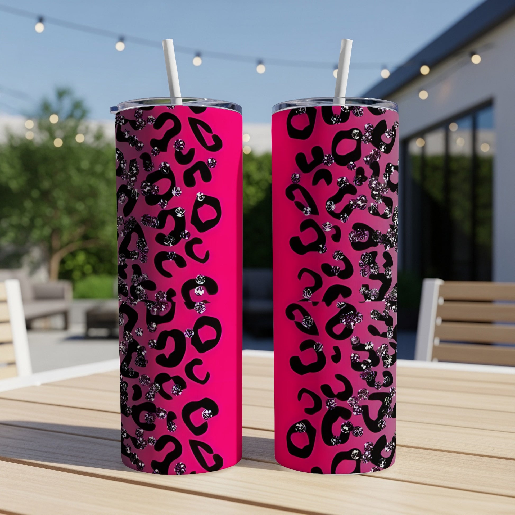 Two hot pink tumblers with black leopard print and glitter accents.