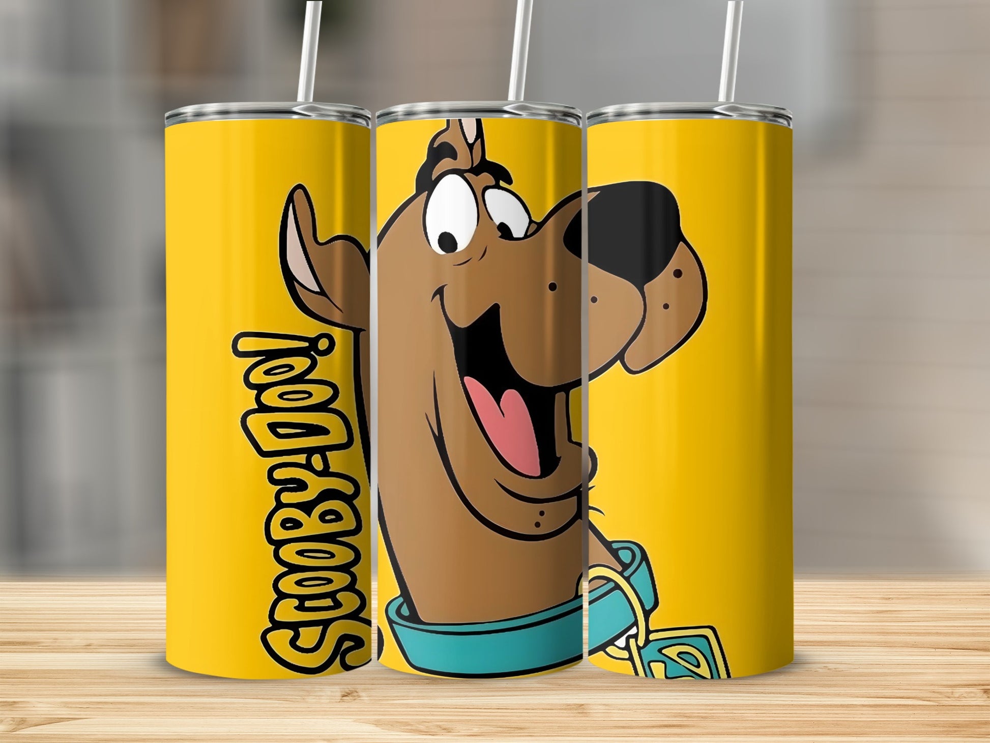 Scooby-Doo character and logo on yellow tumbler.