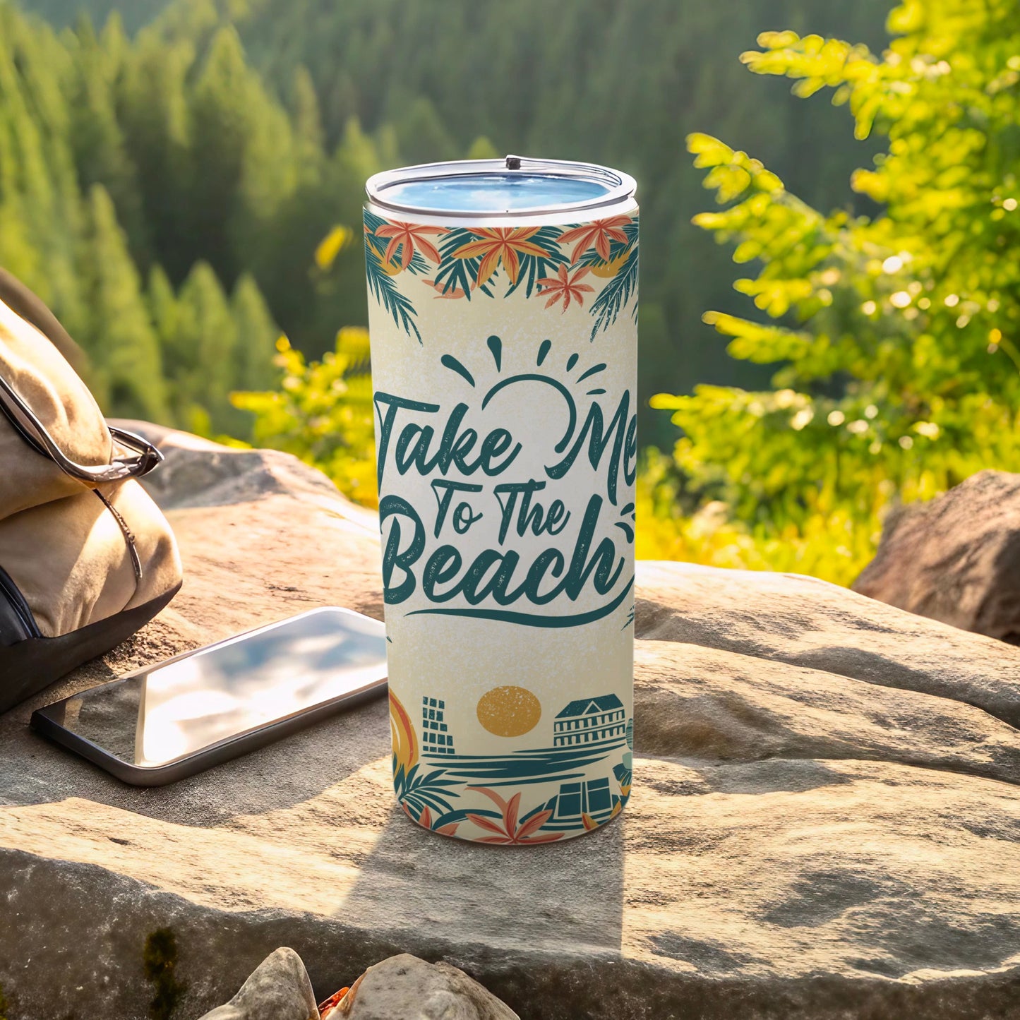 Tumbler with "Take Me To The Beach" text and palm trees on a sunny rock.