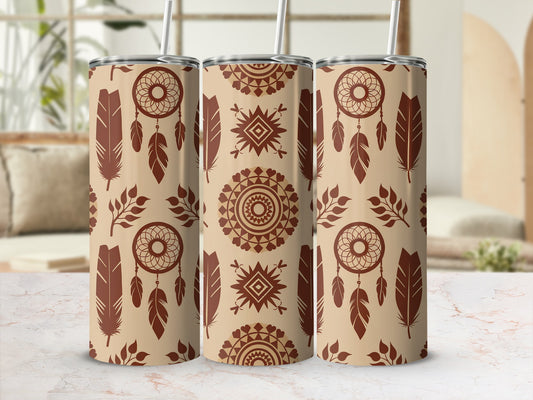 Three tan tumblers with dreamcatcher and feather pattern.