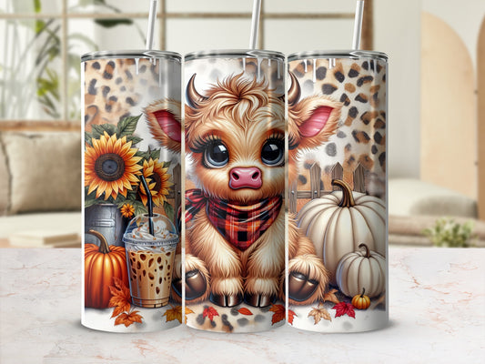 Cute cartoon cow with sunflowers, pumpkins, and leopard print on a tumbler.
