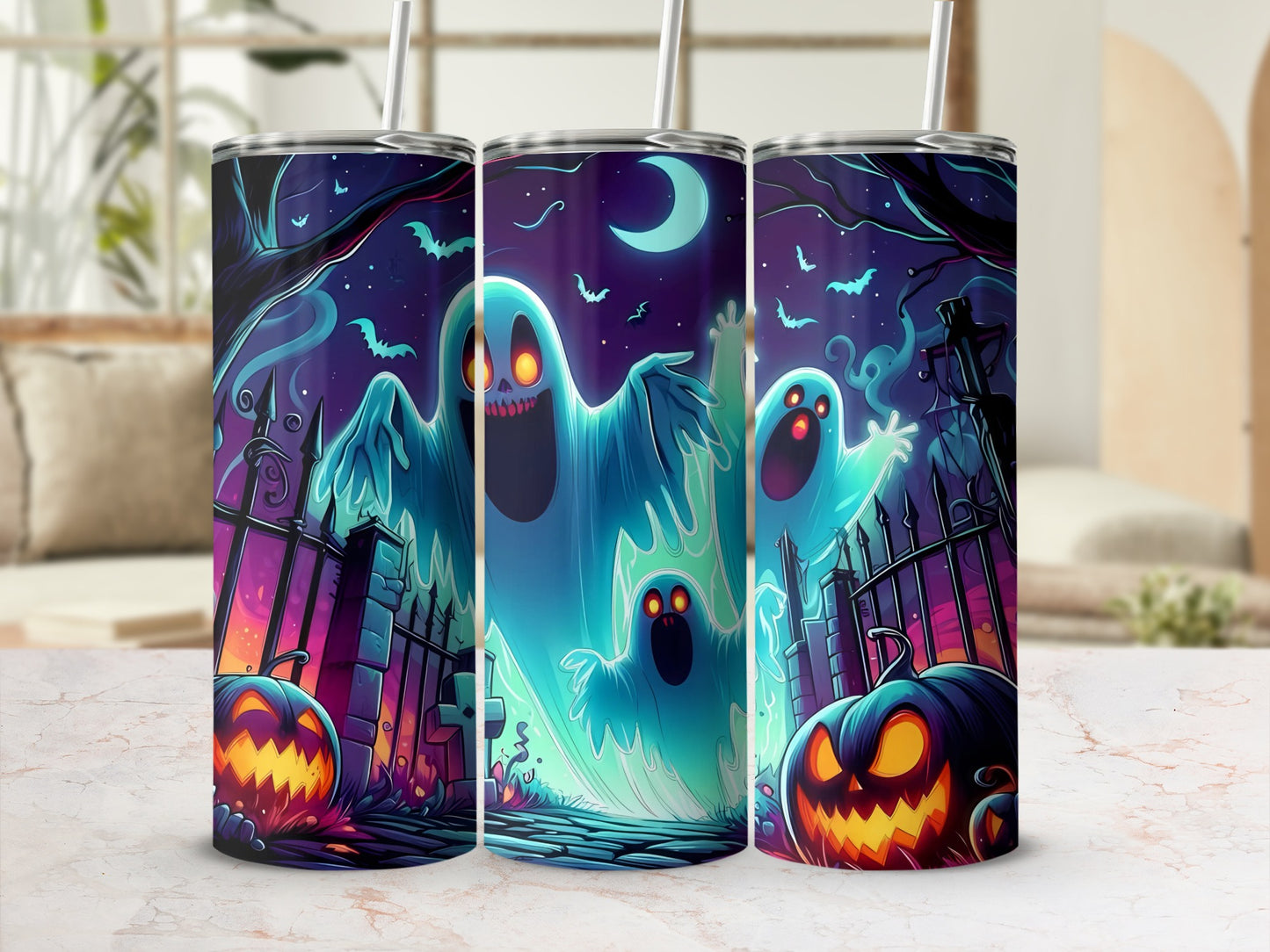 Three tumblers with a spooky Halloween ghost and pumpkin design under a moonlit sky.