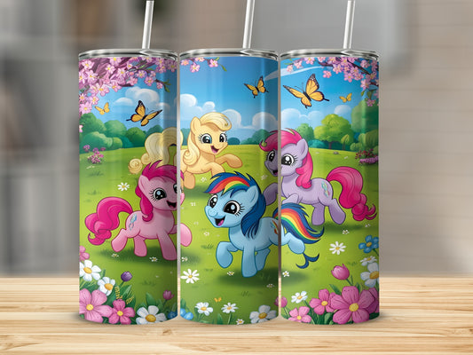 My Little Pony characters in a grassy field with flowers and butterflies.