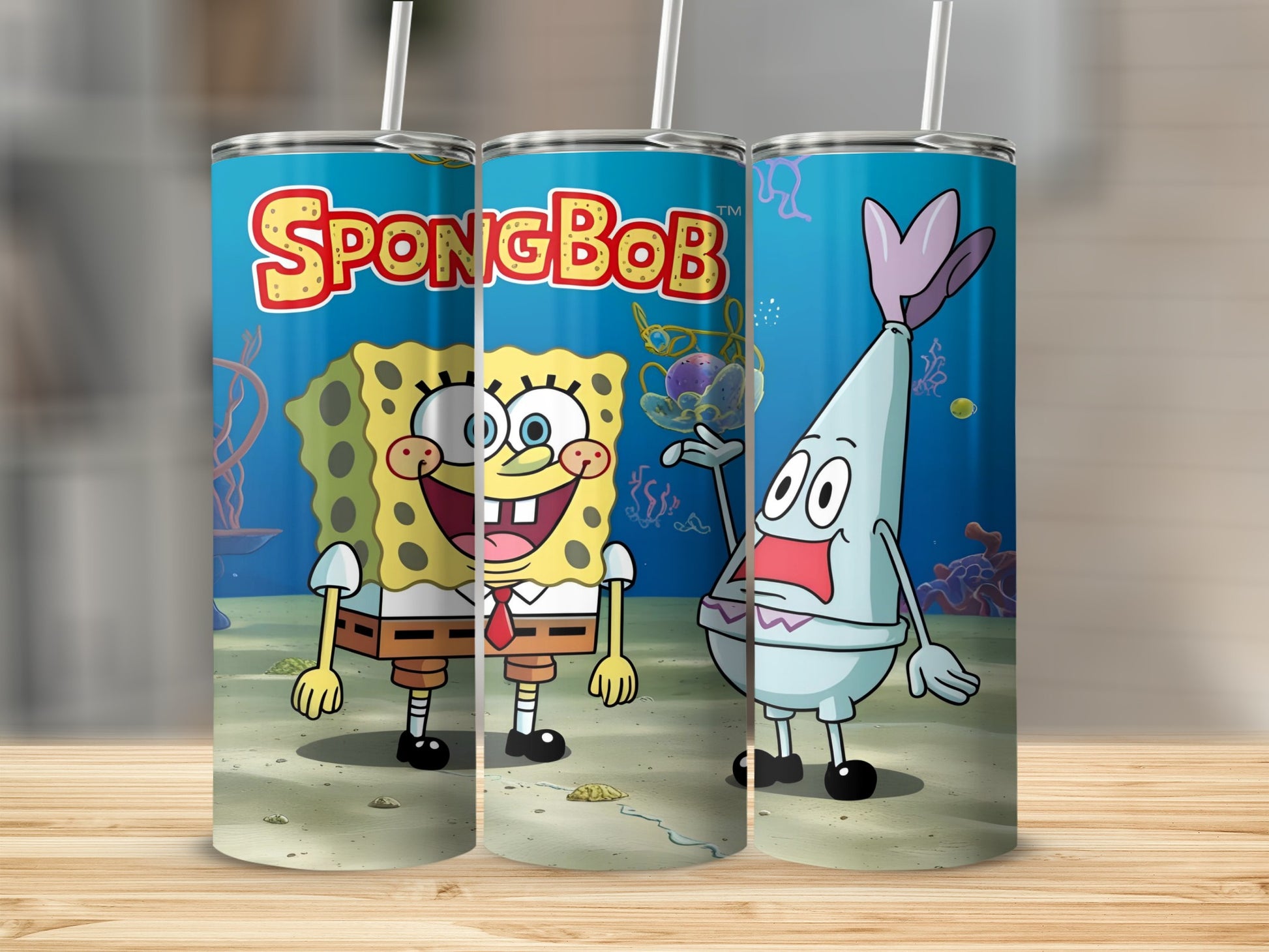 SpongeBob SquarePants and Patrick Star on a tumbler with a sandy ocean background.