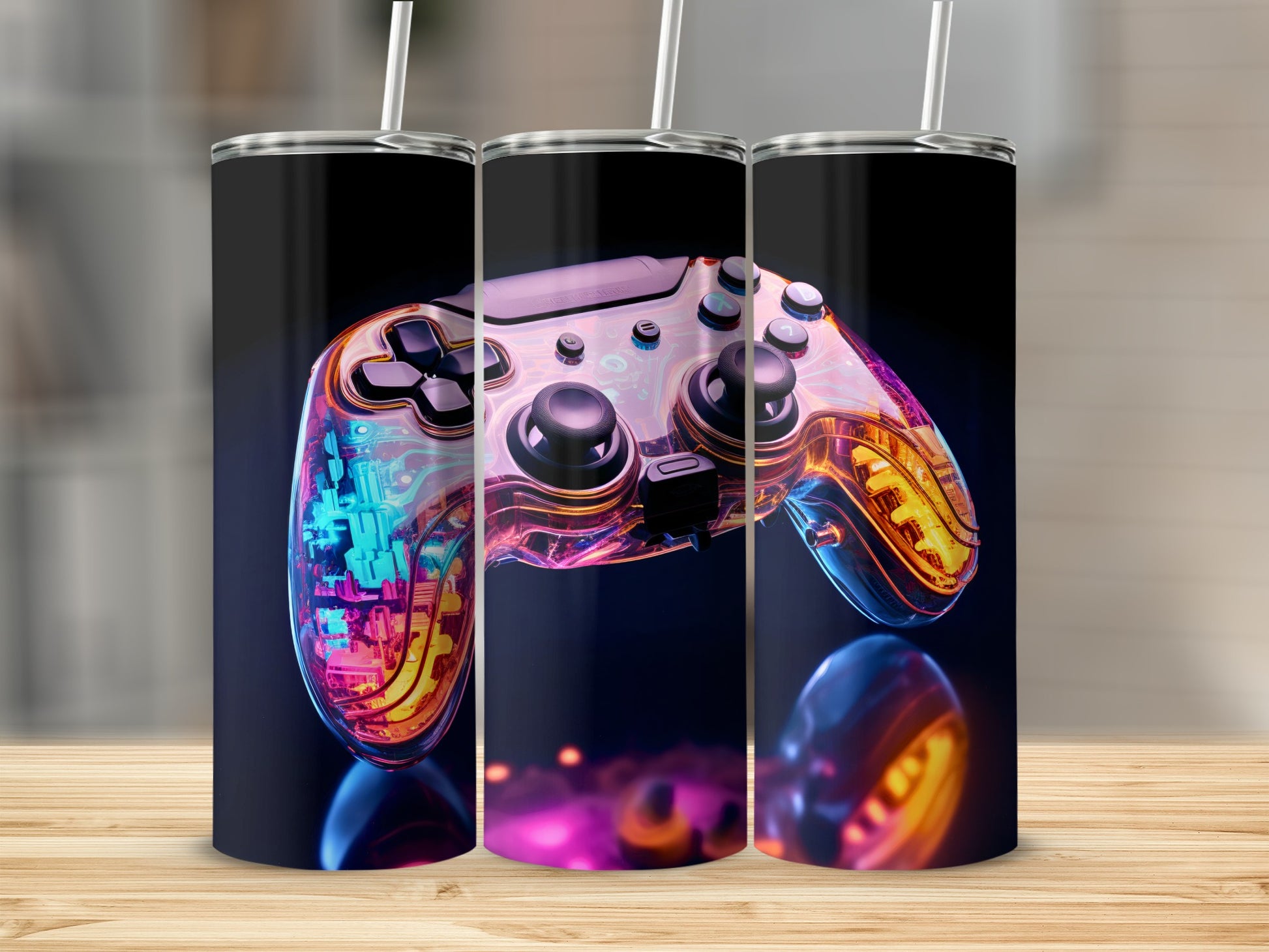 Glow-in-the-dark video game controller design on three tumblers.