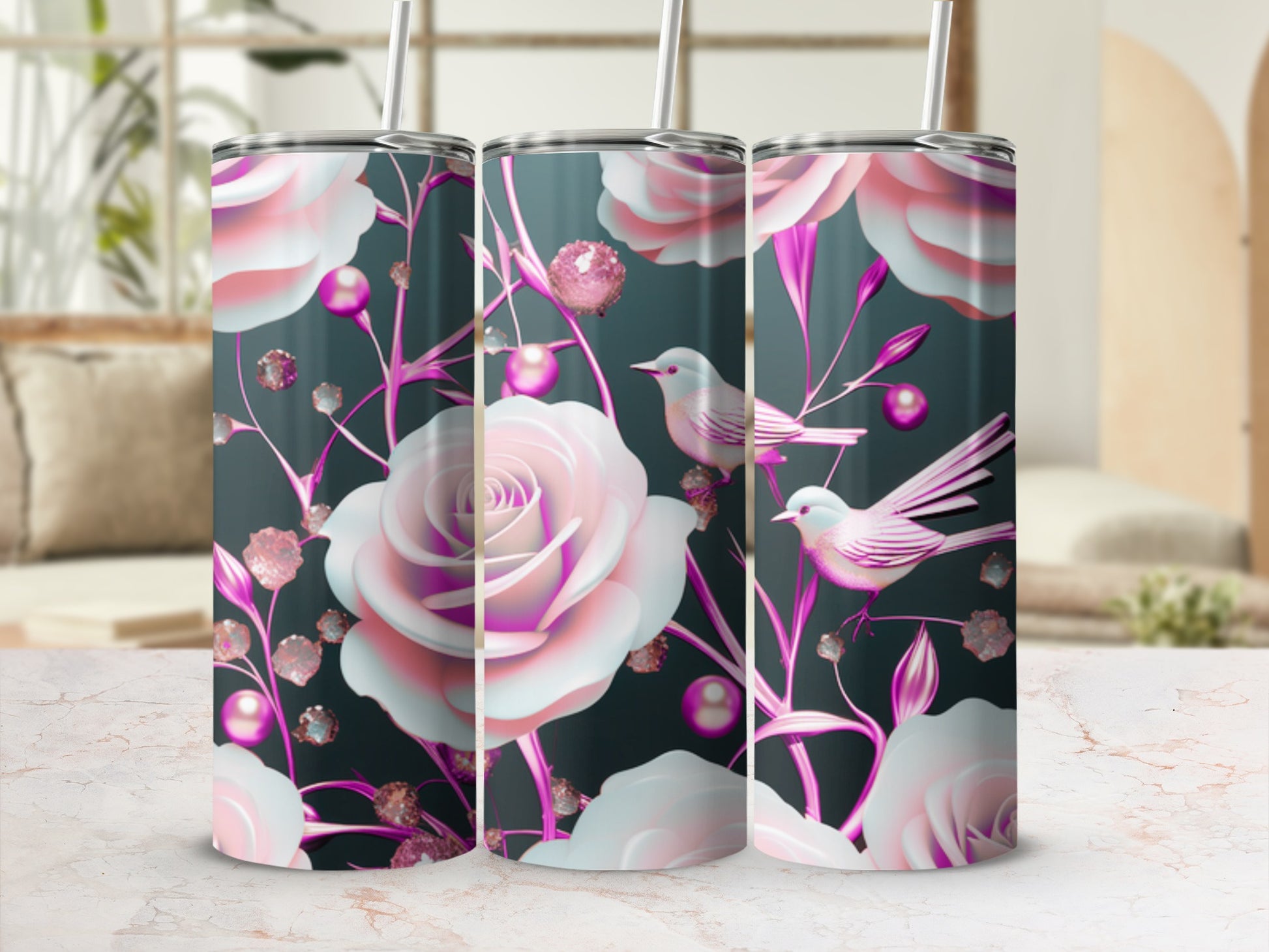 Three tumblers with pink roses, pearls, and birds on a dark floral background.