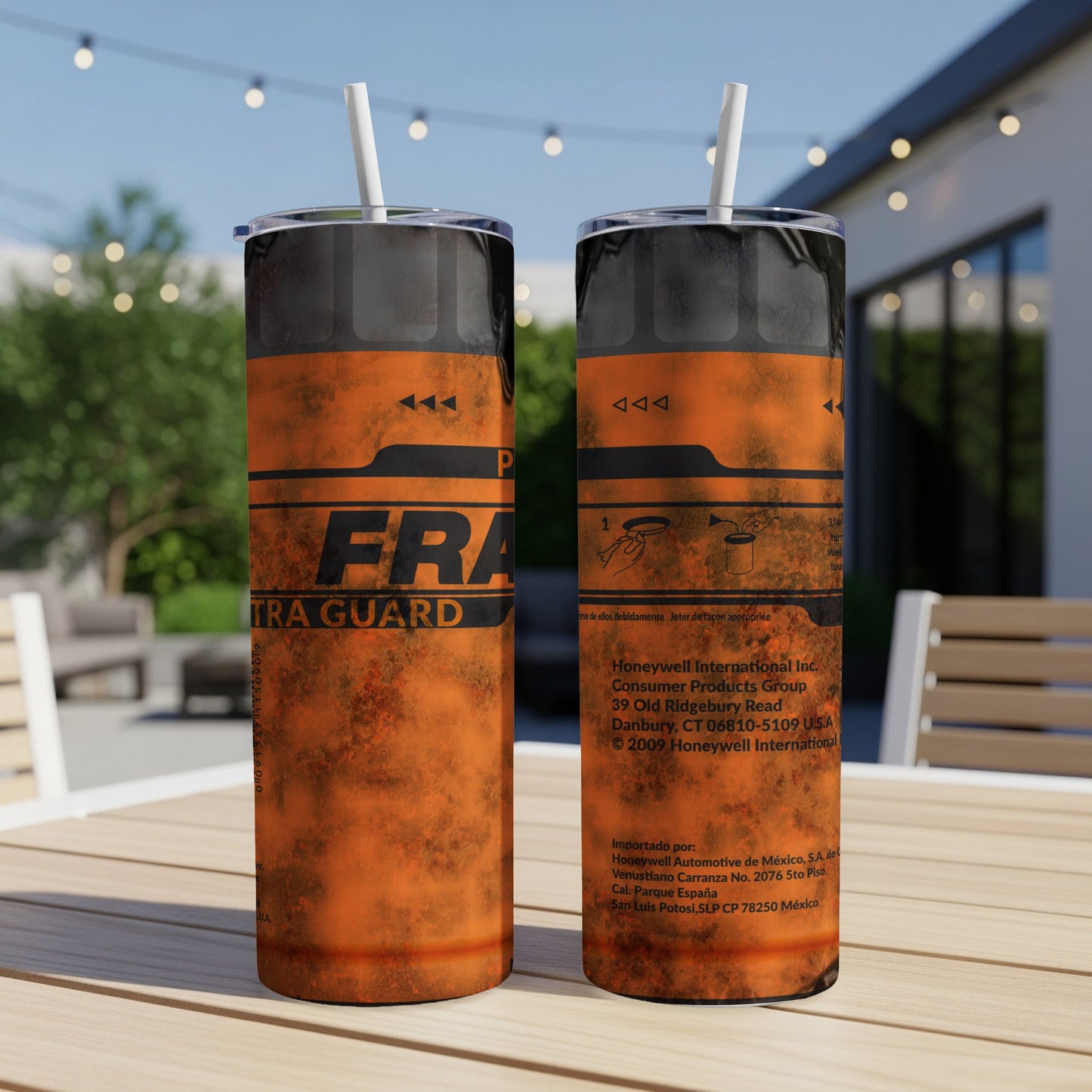 Fraxxa Tra Guard tumbler with orange and black design and product information.