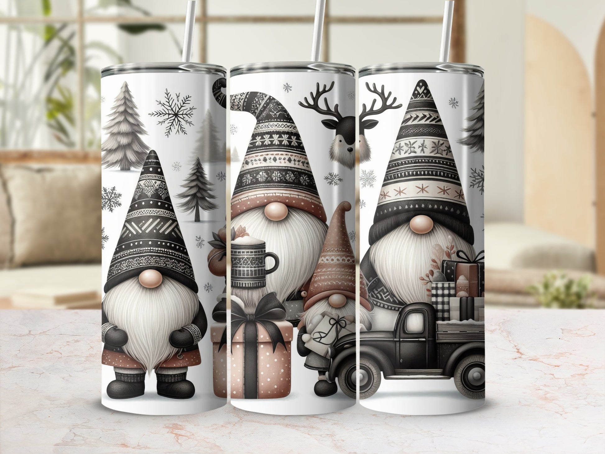 Three gnome tumblers with winter forest designs and deer accents.