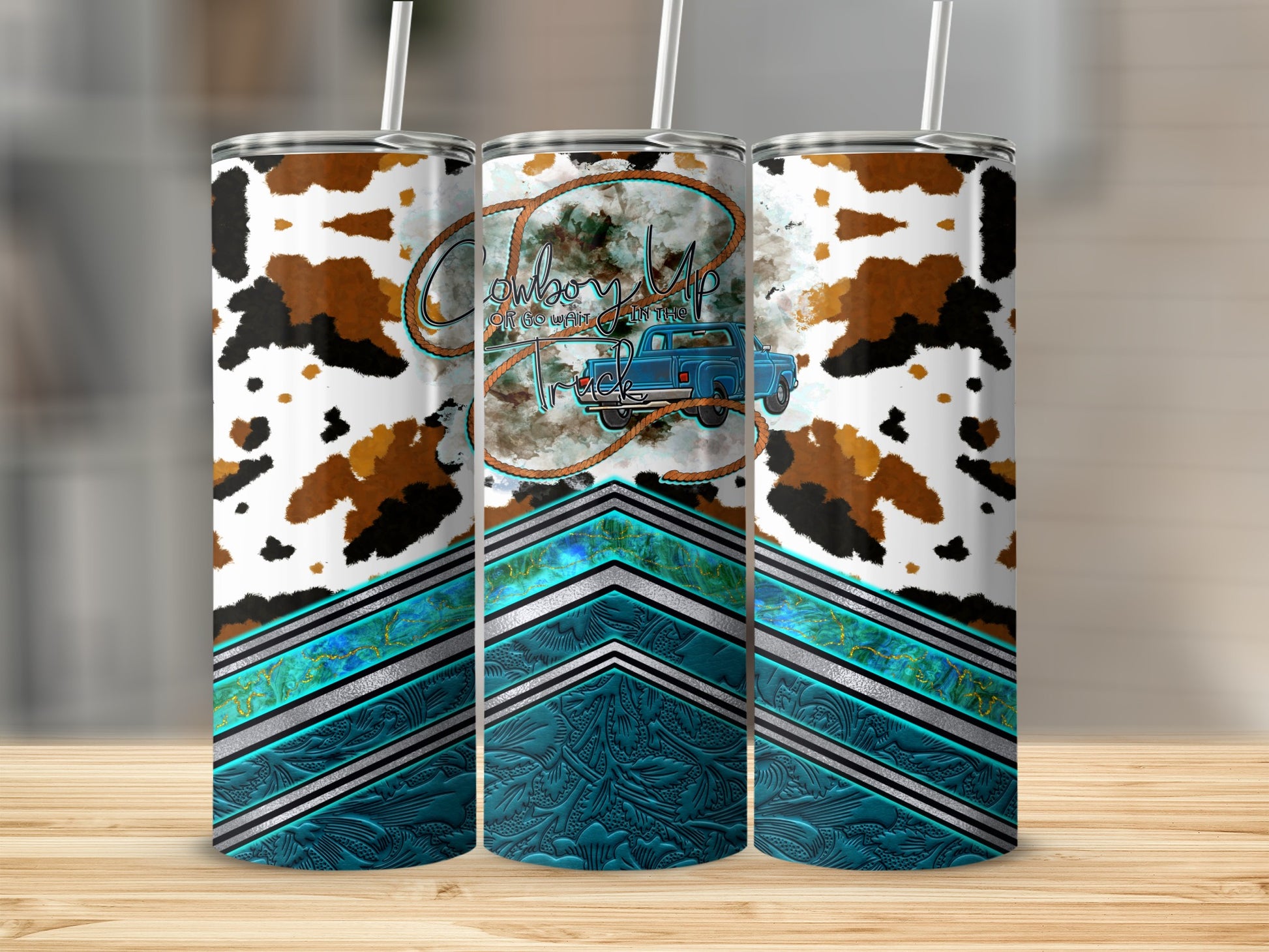Cowboy up truck tumbler with teal chevron and cowhide pattern.