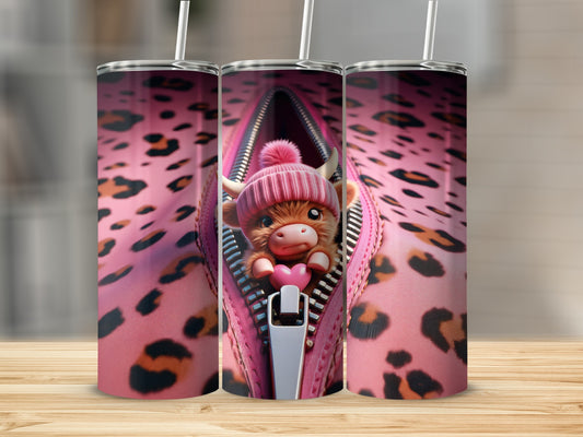 A Highland cow wearing a pink hat peeks out of a pink leopard print zipper.