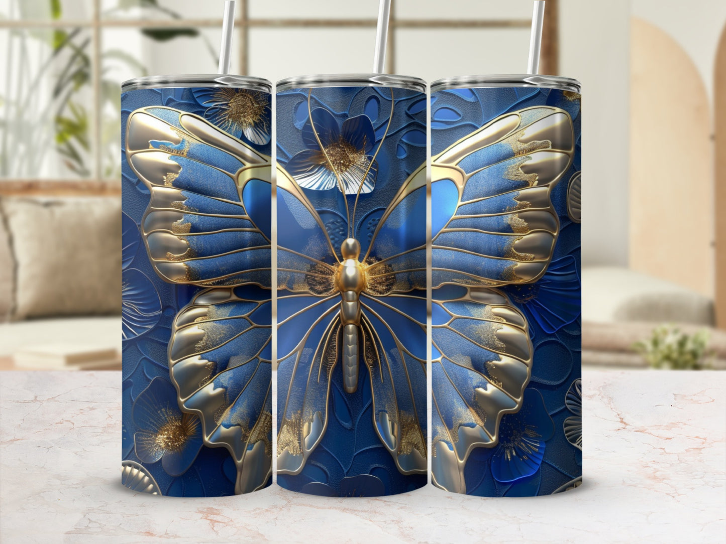 Three tumblers featuring a detailed blue butterfly with gold accents.