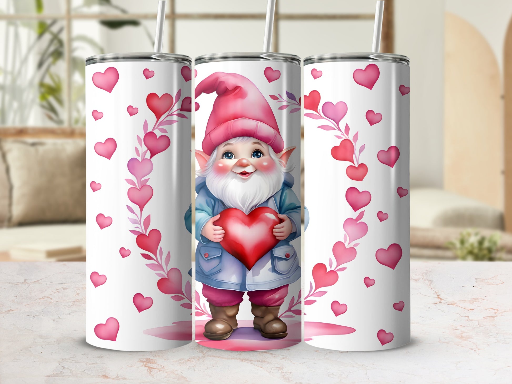 Pink hearts surround a smiling gnome holding a red heart on a white tumbler.