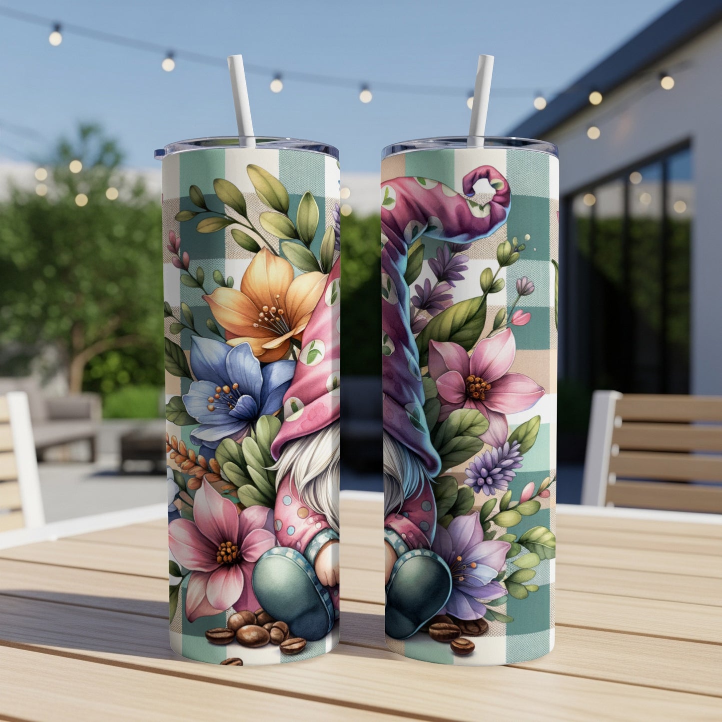 Two tumblers featuring a gnome and floral design on a plaid background.