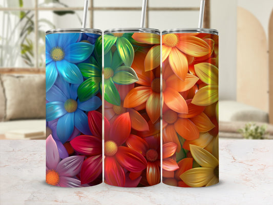 Three tumblers with colorful floral designs in blue, green, and orange gradients.