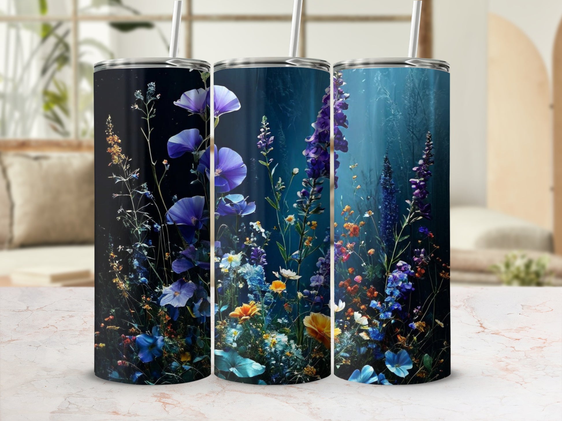 Three tumblers with a dark floral and botanical design.