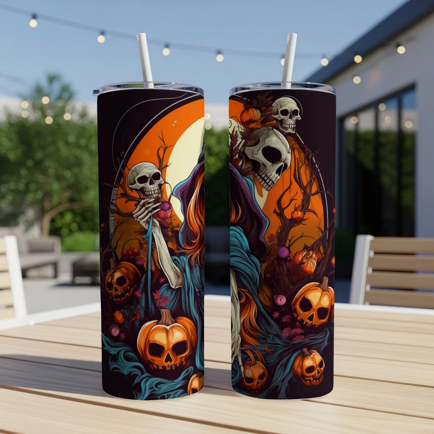 Two tumblers with Halloween art featuring skeletons, pumpkins, and dark, flowing designs.