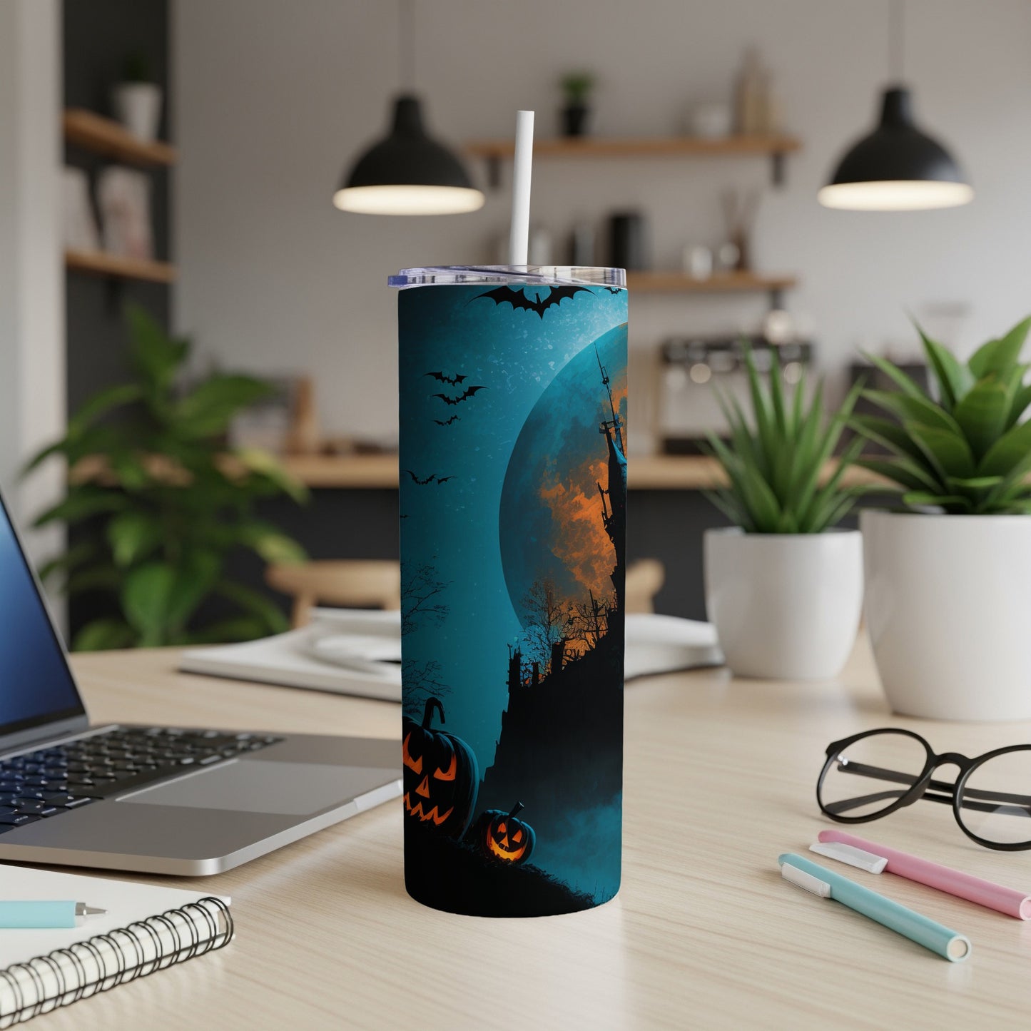 Halloween tumbler with jack-o'-lanterns, bats, and haunted castle under a full moon.