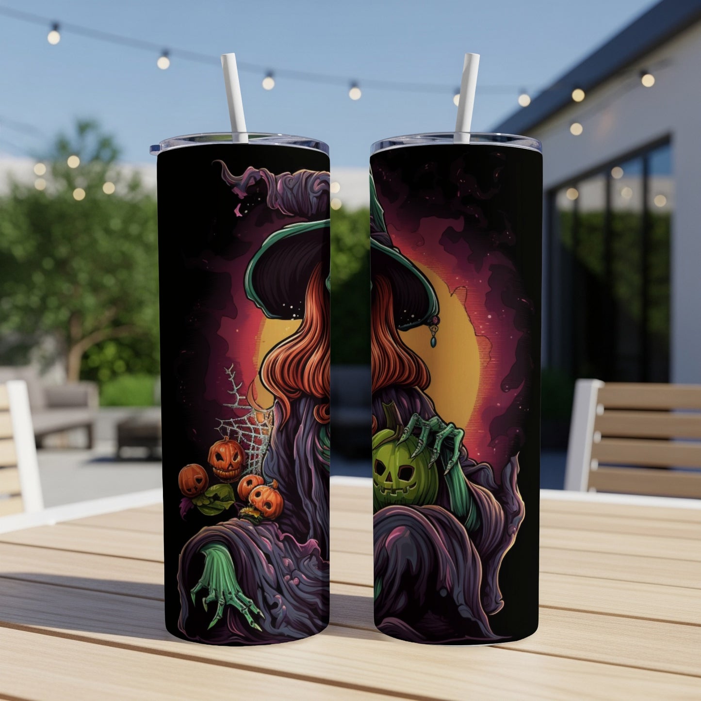 Two tumblers with a Halloween witch design holding pumpkins and a carved jack-o'-lantern.