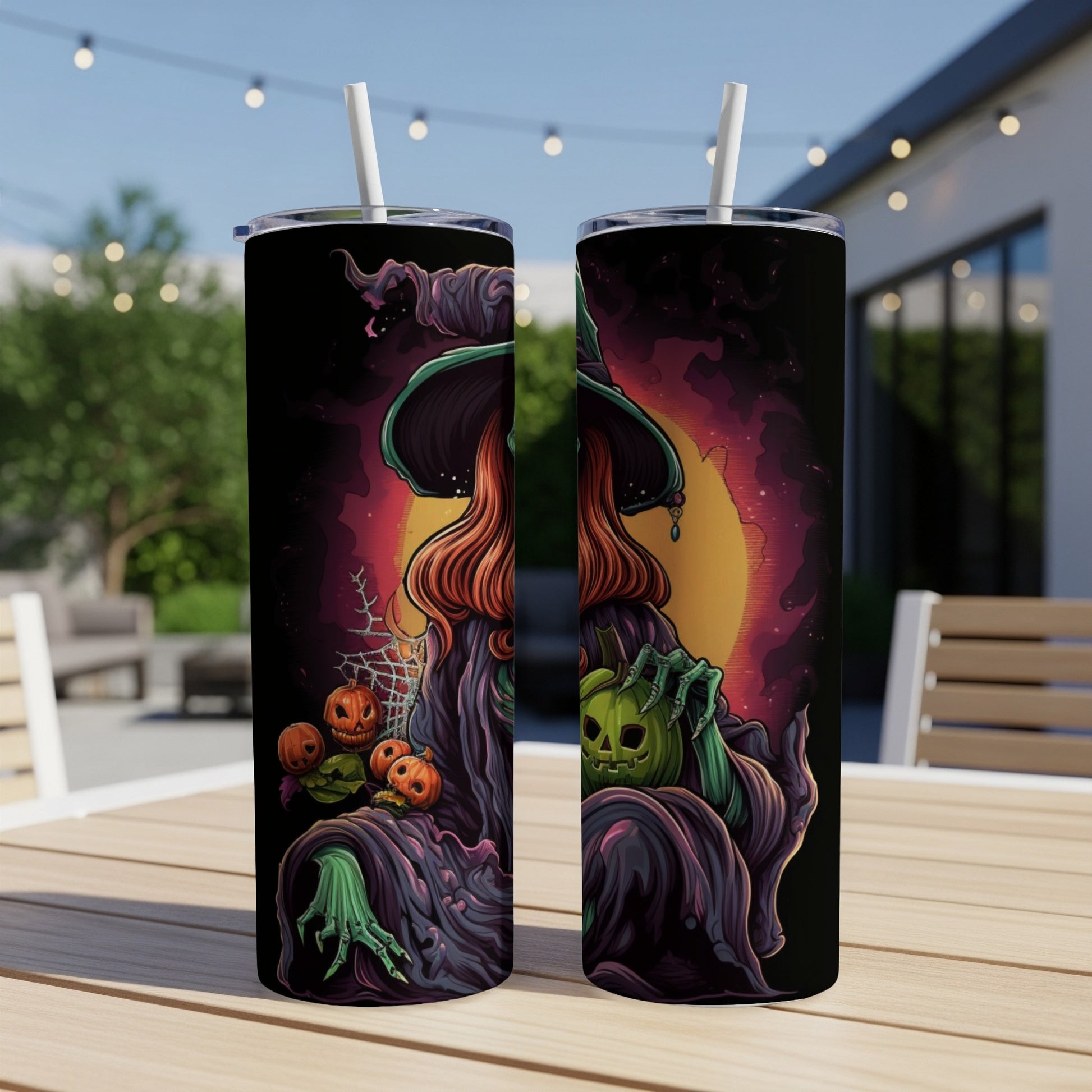 Two tumblers with a Halloween witch design holding pumpkins and a carved jack-o'-lantern.