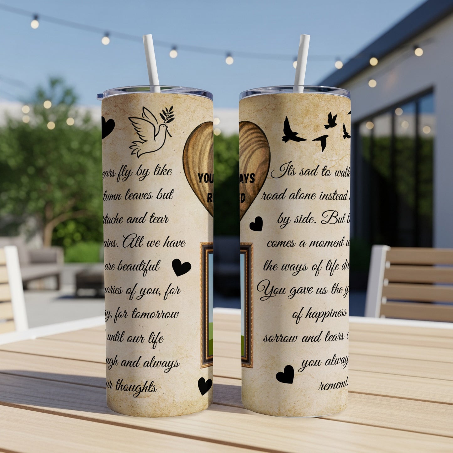 Two tumblers with a heart, dove, and birds on a parchment-like design.