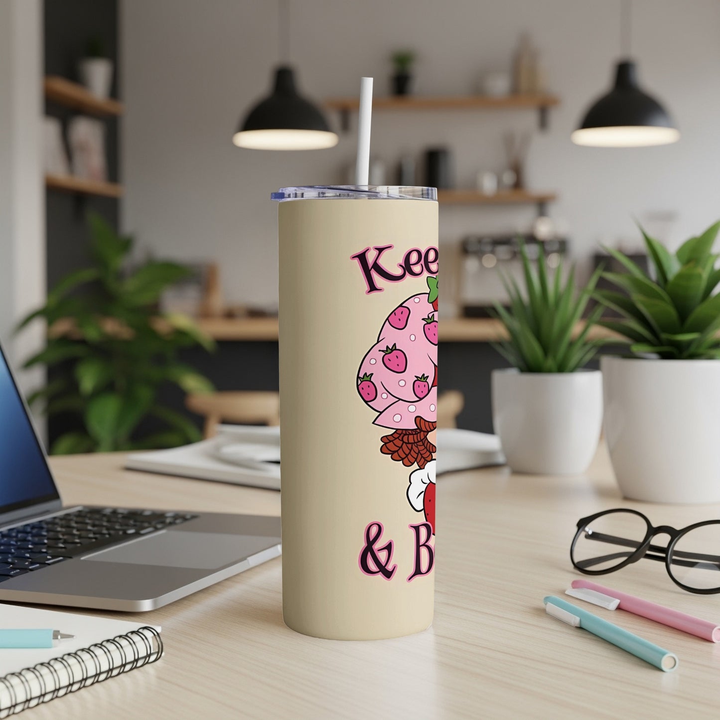 Cream tumbler with strawberry mushroom design and "Keep it Berry" text.