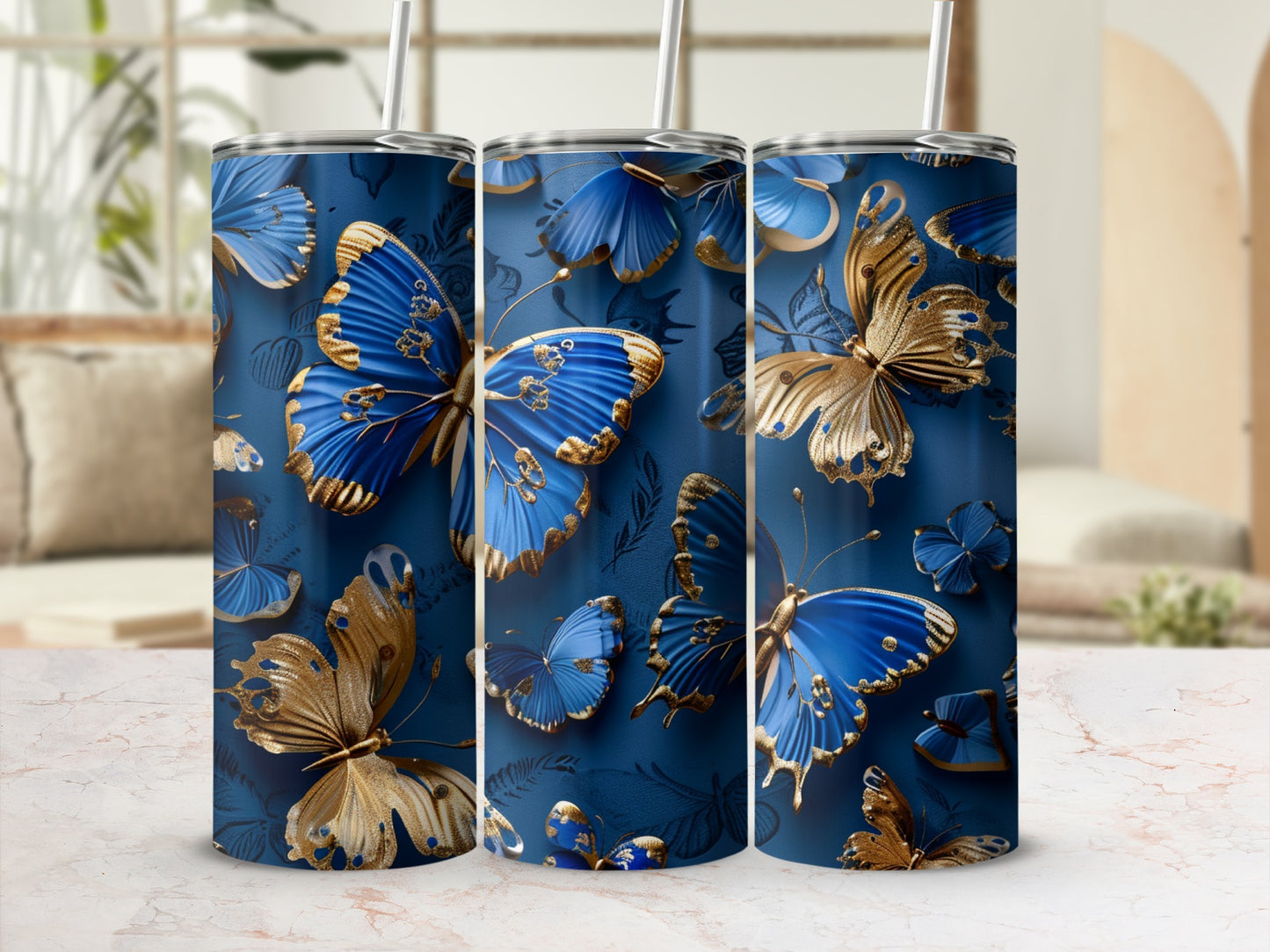 Blue and gold butterflies on a dark blue background, wrapping around three tumblers.