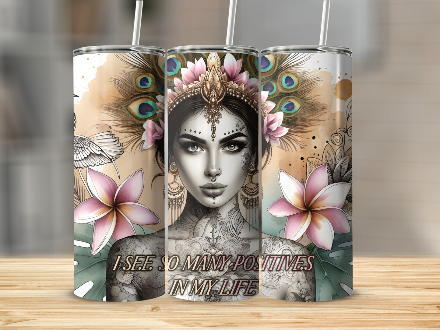 Tumbler with a woman's face, feathers, flowers, and text "I SEE SO MANY POSITIVES IN MY LIFE."