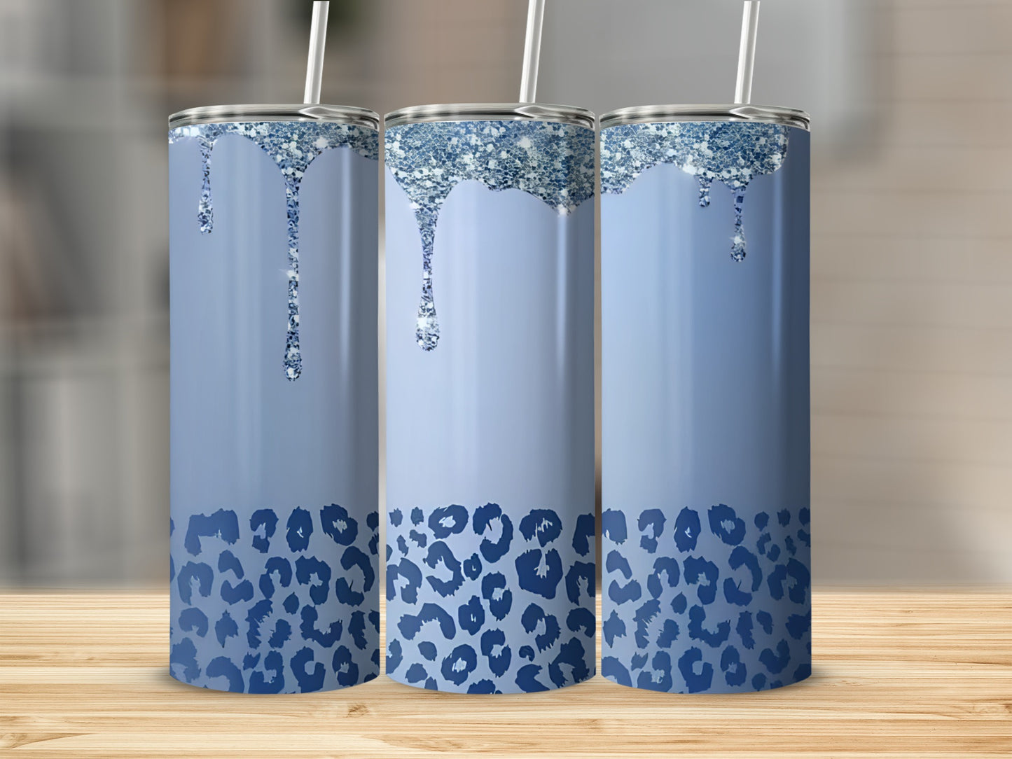 Blue tumbler with glitter drips and leopard print.