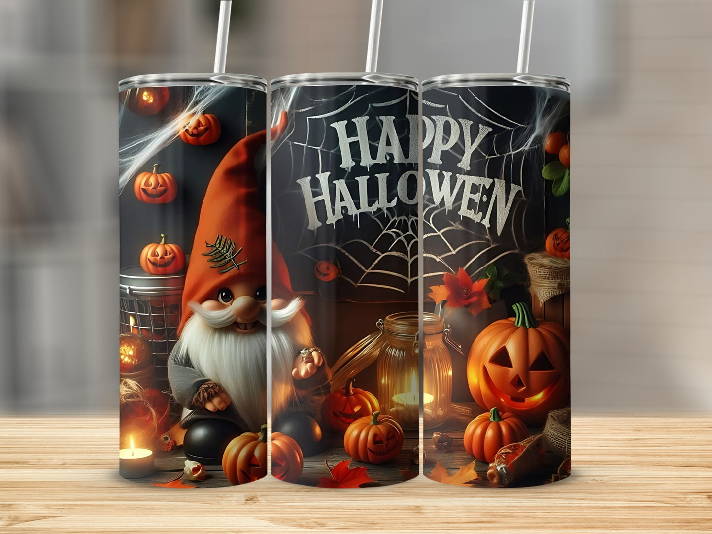 Halloween gnome, pumpkins, and "Happy Halloween" text on three tumblers.