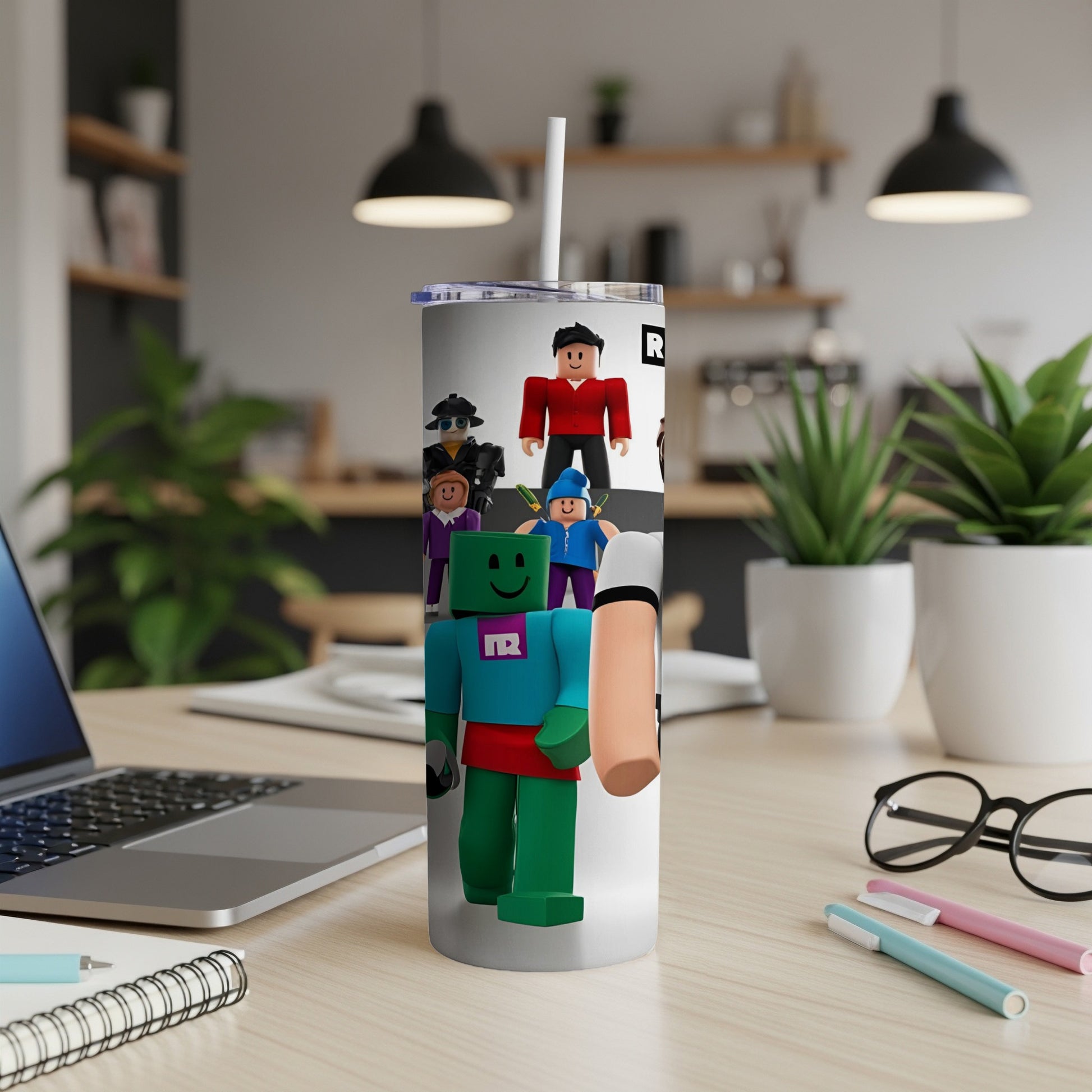 Roblox characters on a white tumbler with a straw.