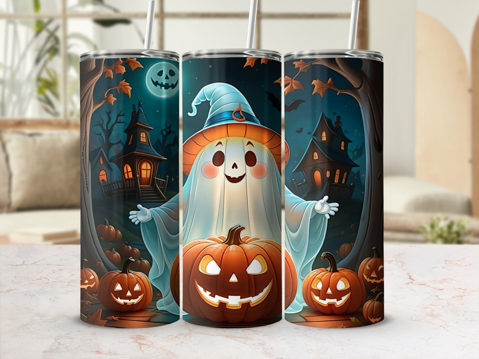 Three tumblers featuring a cartoon ghost, pumpkins, and haunted houses.