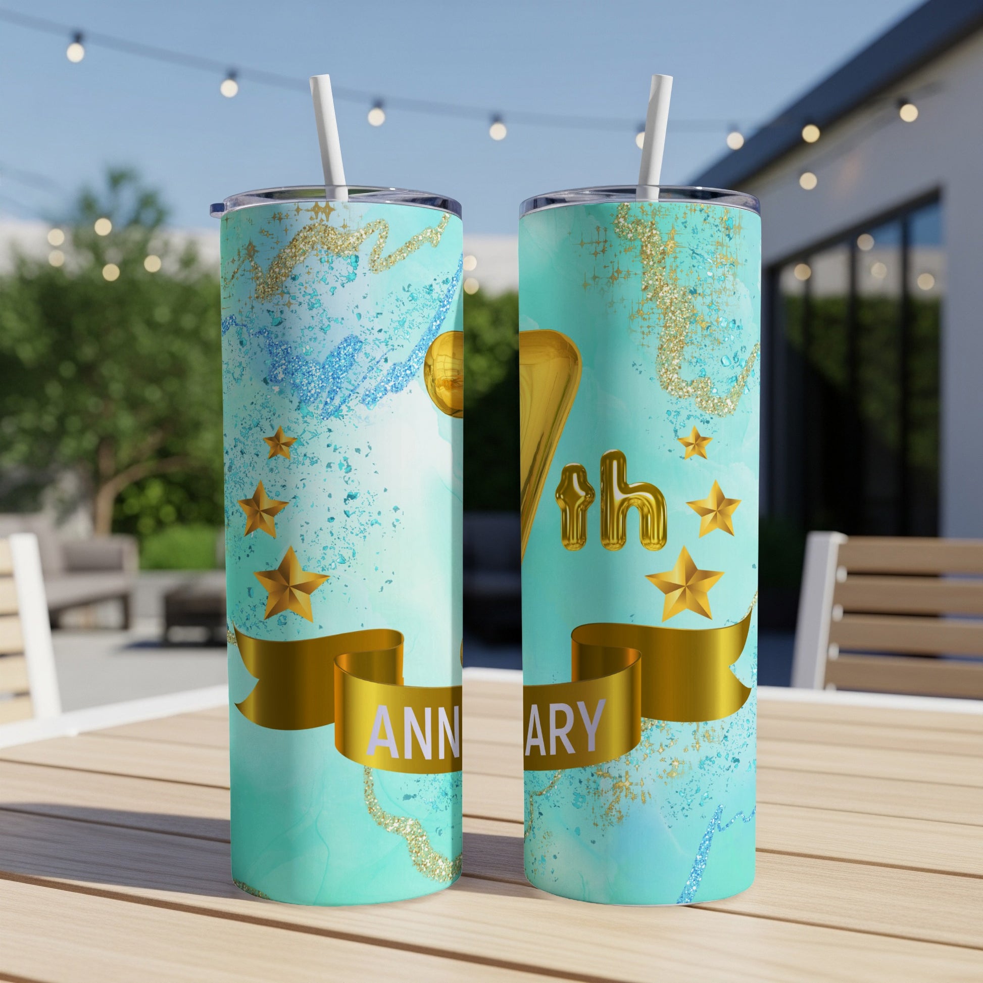 Gold "70TH ANNIVERSARY" text on blue and gold marbled tumbler.