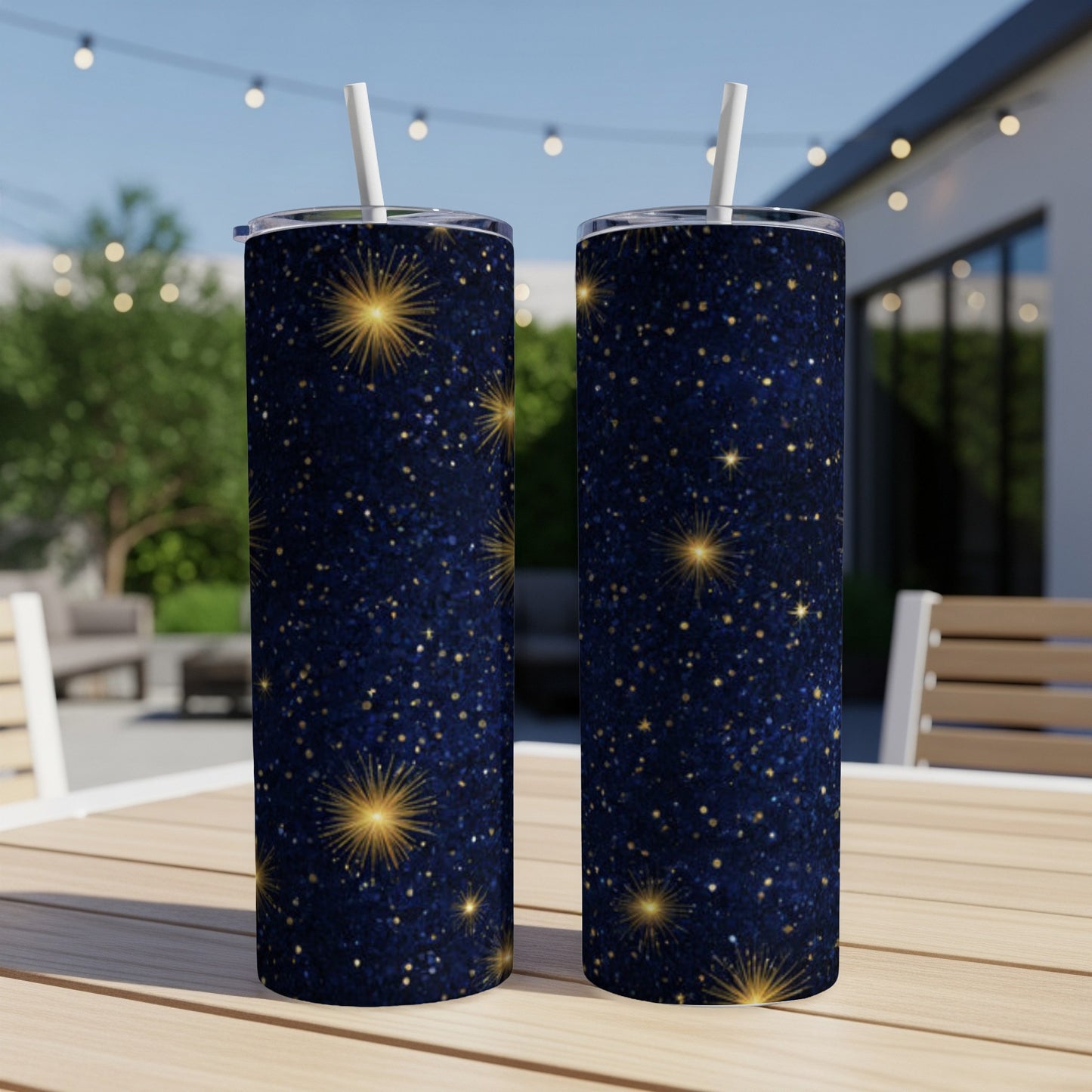 Two tall, dark blue tumblers with gold star glitter pattern.