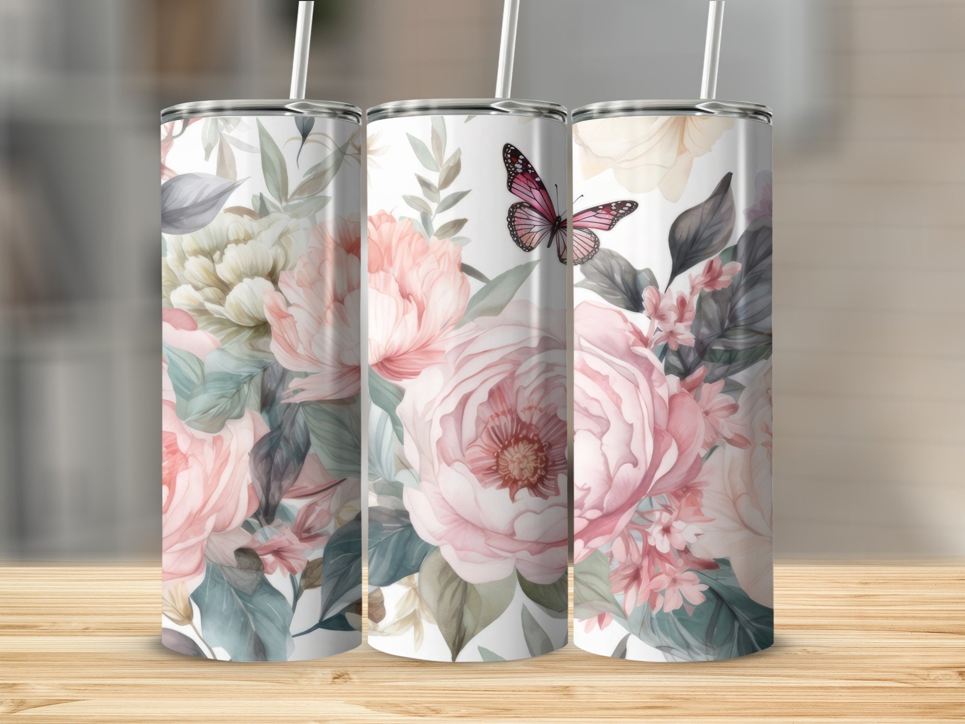 Three tumblers with pink peonies and a butterfly design.