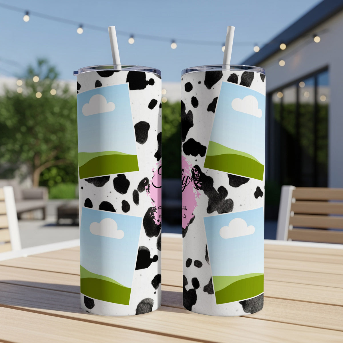Cow print tumblers with landscape and cloud photo frames and pink text.