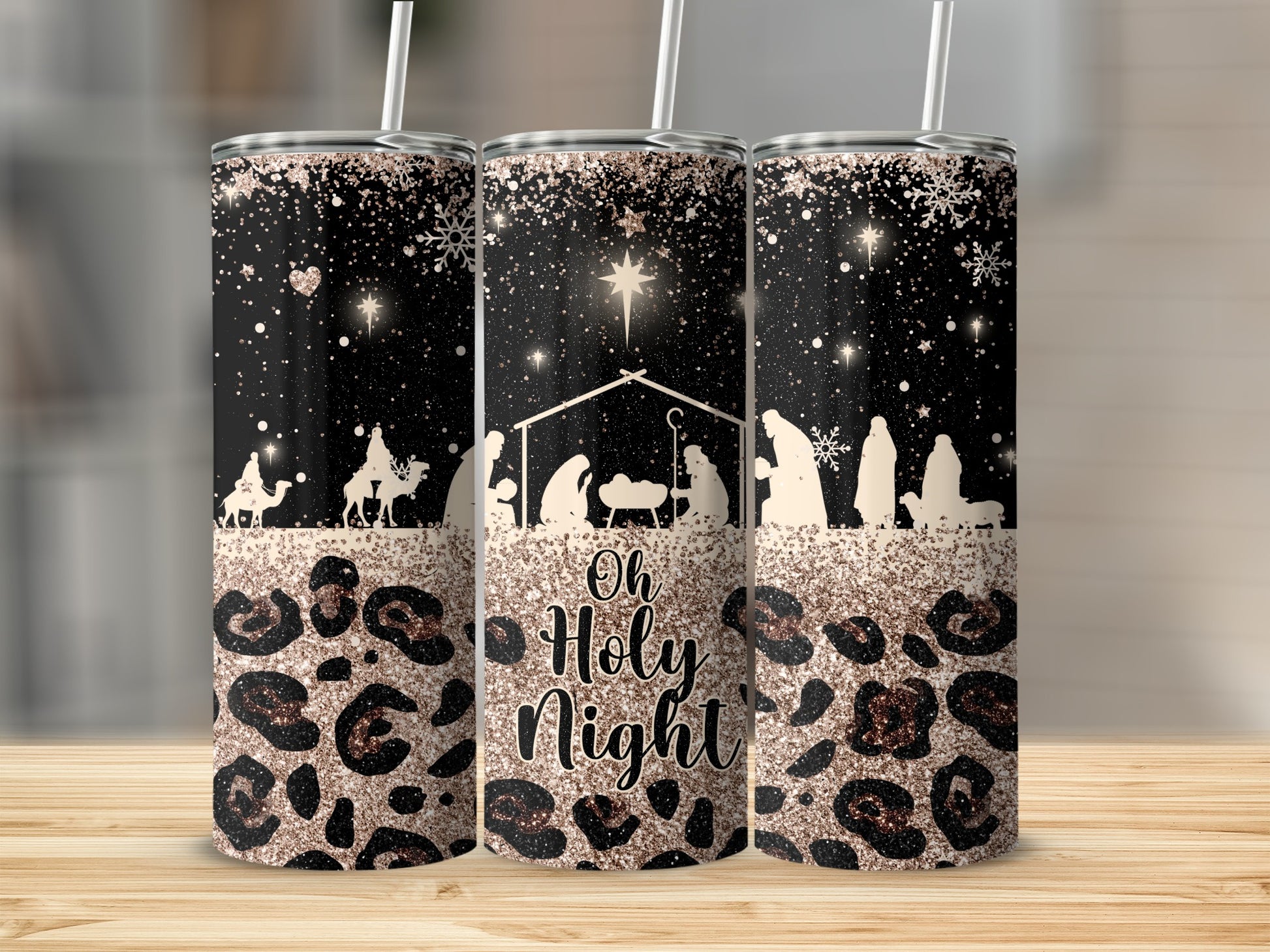 Nativity scene with "Oh Holy Night" text on a sparkly black and leopard print tumbler.