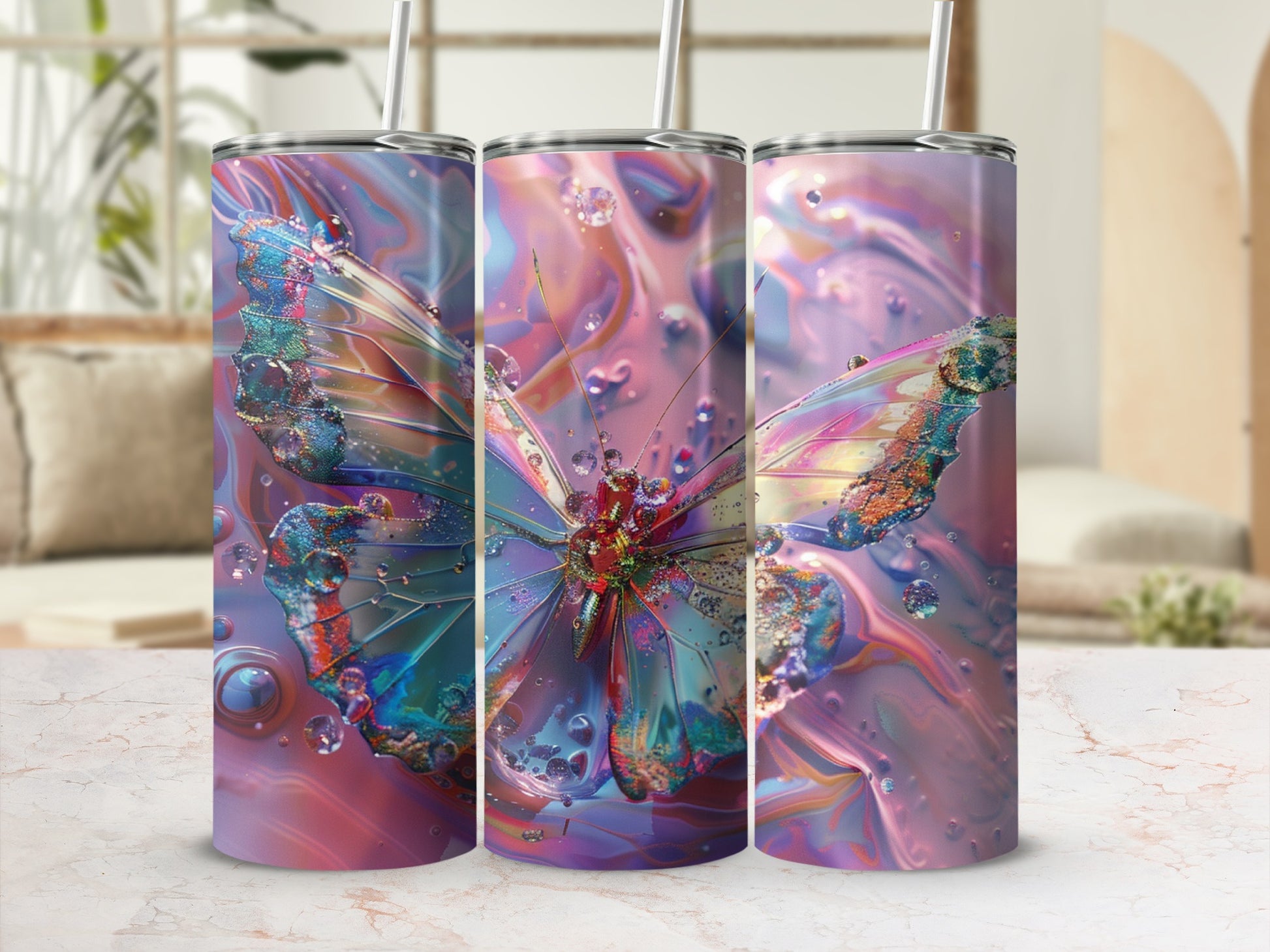 Three tumblers featuring a colorful iridescent butterfly and water droplets.